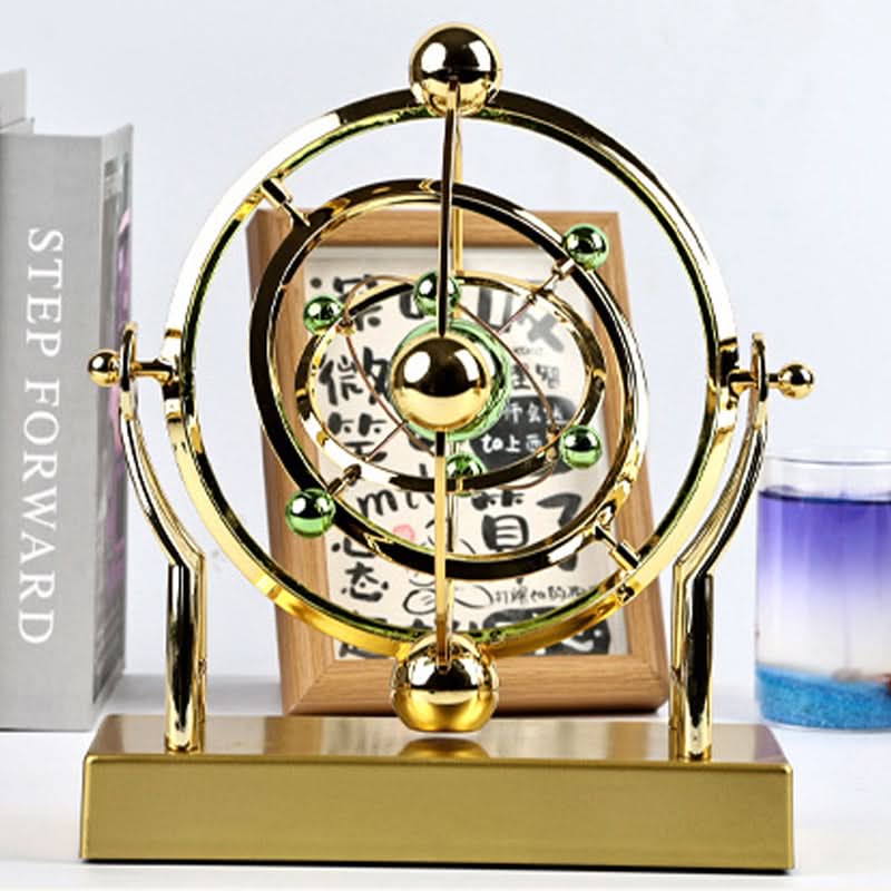 🔥Pendule à mouvement perpétuel en orbite céleste – Décoration rotative créative pour la maison