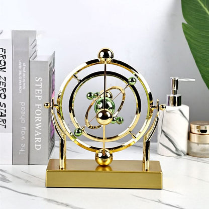 🔥Pendule à mouvement perpétuel en orbite céleste – Décoration rotative créative pour la maison